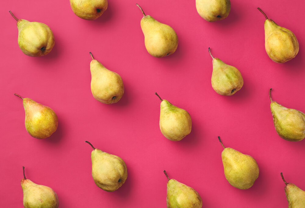 fresh-pears-on-bright-pink-background