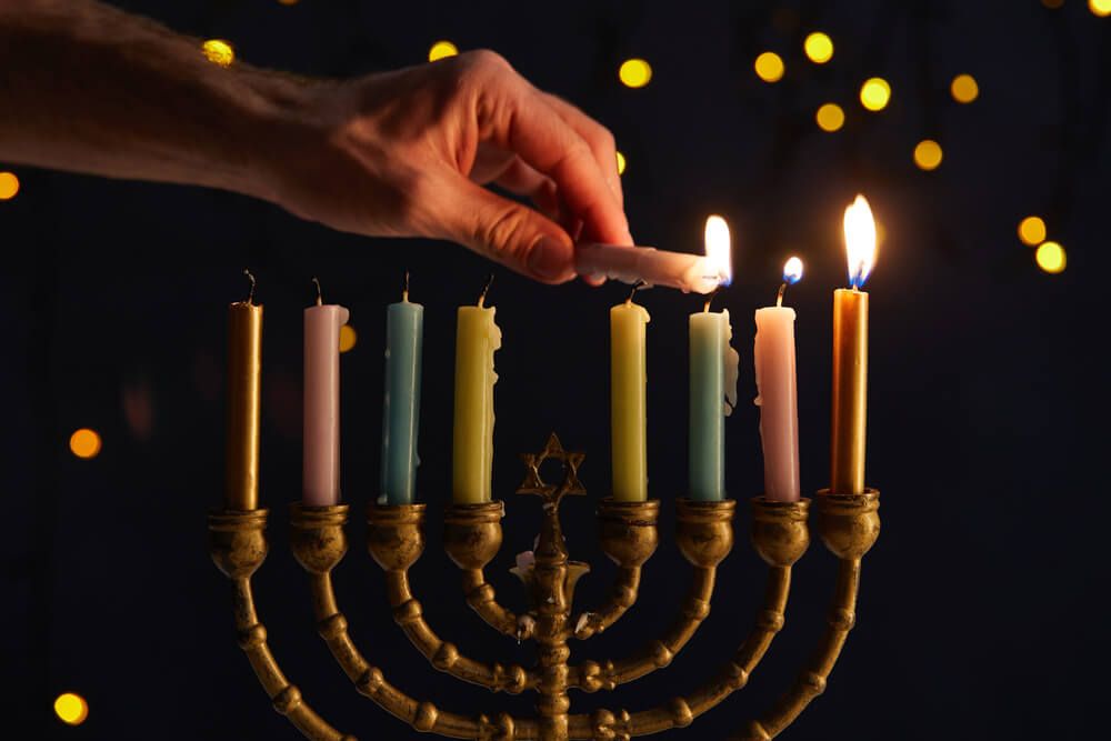 lighting-the-third-candle-of-the-hanukkah-menora