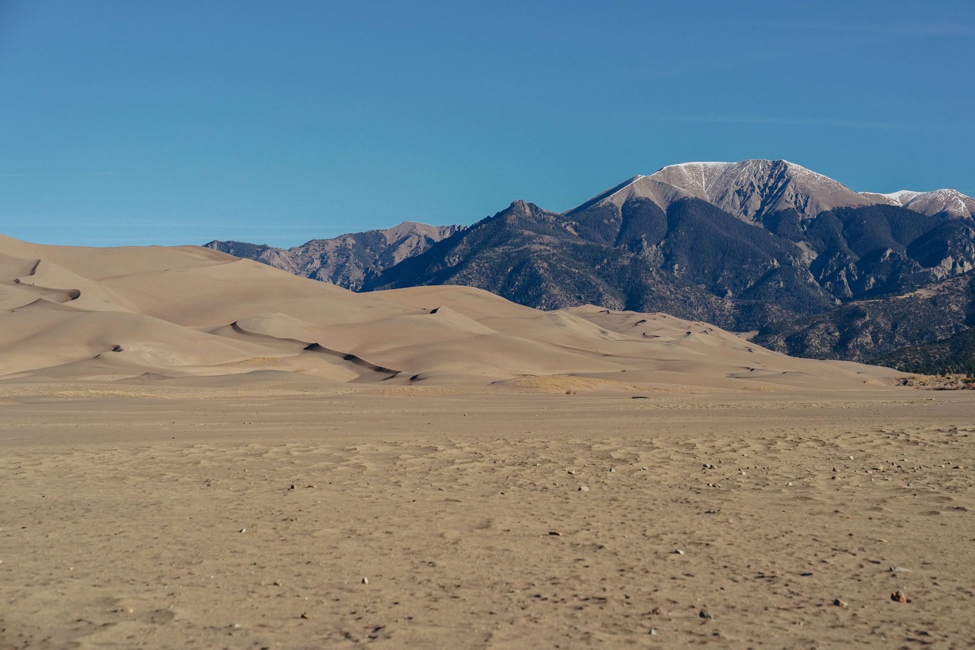 Great-Sand-Dunes-National-Park-and-Preserve-with-a-clear-blue-sky